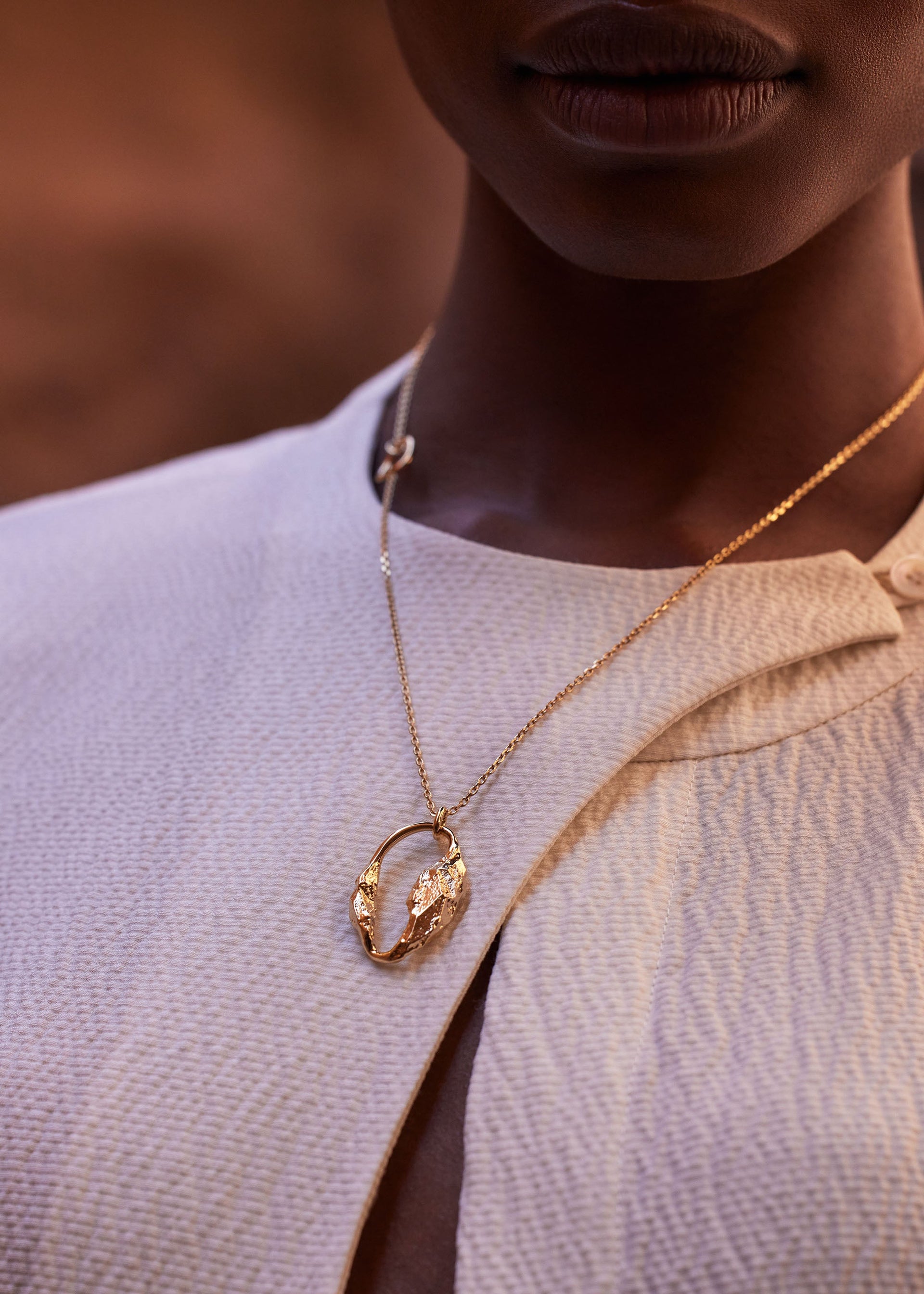 Colgante Eroz​ - chapada en oro de 24 quilates​